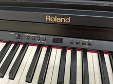 Load image into Gallery viewer, Roland RP301 digital piano and stool in satin black finish stock number 23508
