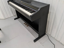 Load image into Gallery viewer, Roland RP301 digital piano and stool in satin black finish stock number 23508
