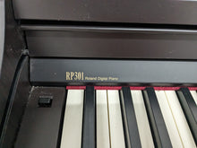 Load image into Gallery viewer, Roland RP301 digital piano + matching stool in dark rosewood stock number 24001

