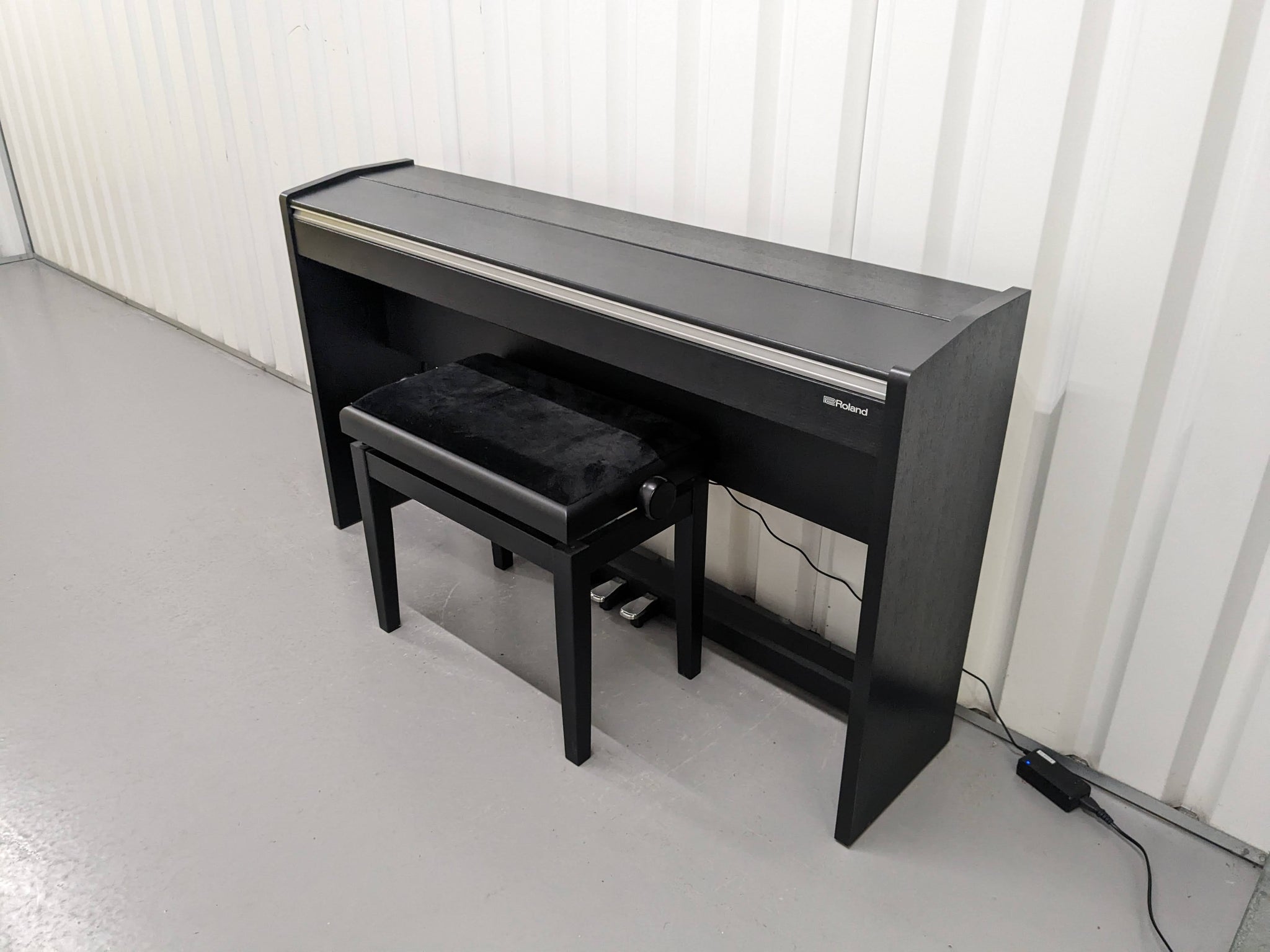 Roland F140R digital piano and stool in satin black finish stock numbe –  Sulinda Music