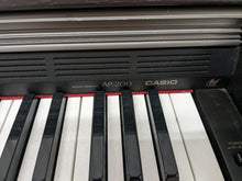Load image into Gallery viewer, CASIO CELVIANO AP-200 DIGITAL PIANO IN DARK ROSEWOOD stock #24004
