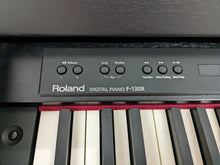 Load image into Gallery viewer, Roland F130R compact slim size Digital Piano in black  stock # 24006

