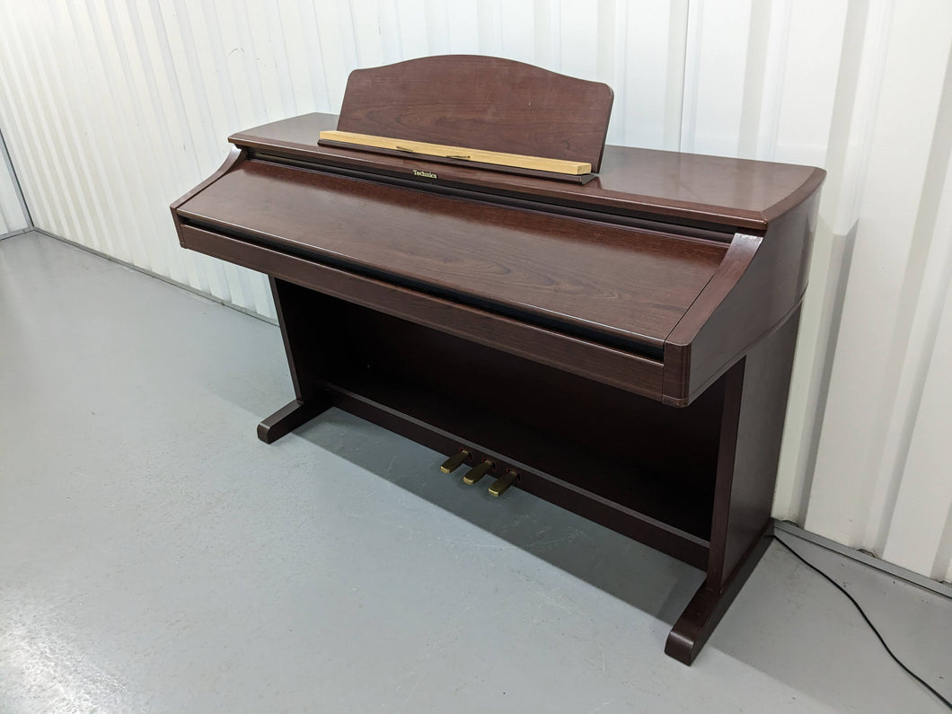 TECHNICS SX-PX665 DIGITAL PIANO IN MAHOGANY stock number 24050