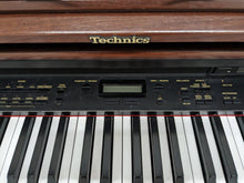 Load image into Gallery viewer, TECHNICS SX-PX665 DIGITAL PIANO IN MAHOGANY stock number 24050
