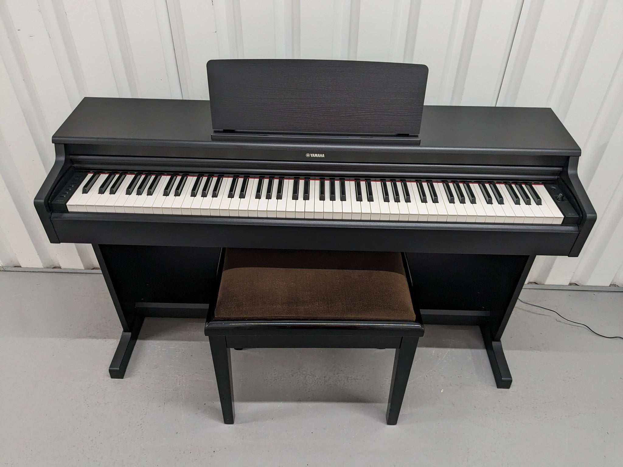 Yamaha Arius YDP-165 digital piano and stool in satin black finish