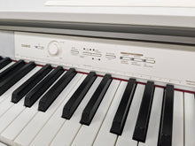 Load image into Gallery viewer, Casio Celviano AP-450 digital piano and stool in satin white finish stock #24065
