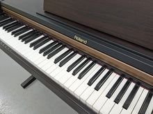 Load image into Gallery viewer, Roland HP101e digital piano and stool in dark rosewood finish stock #24061
