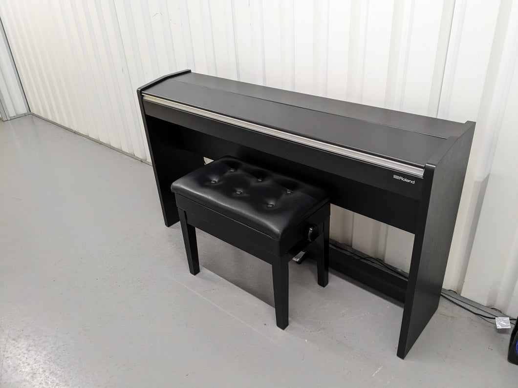 Roland F140R Digital Piano in black with matching colour stool stock # 24063