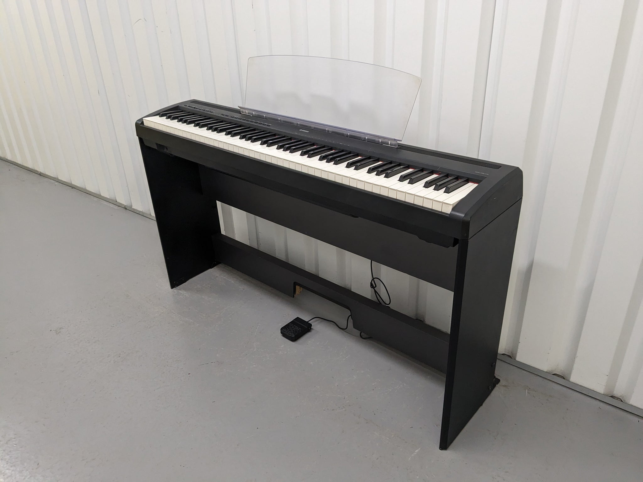 Yamaha P95 digital portable piano and fixed stand in black finish 