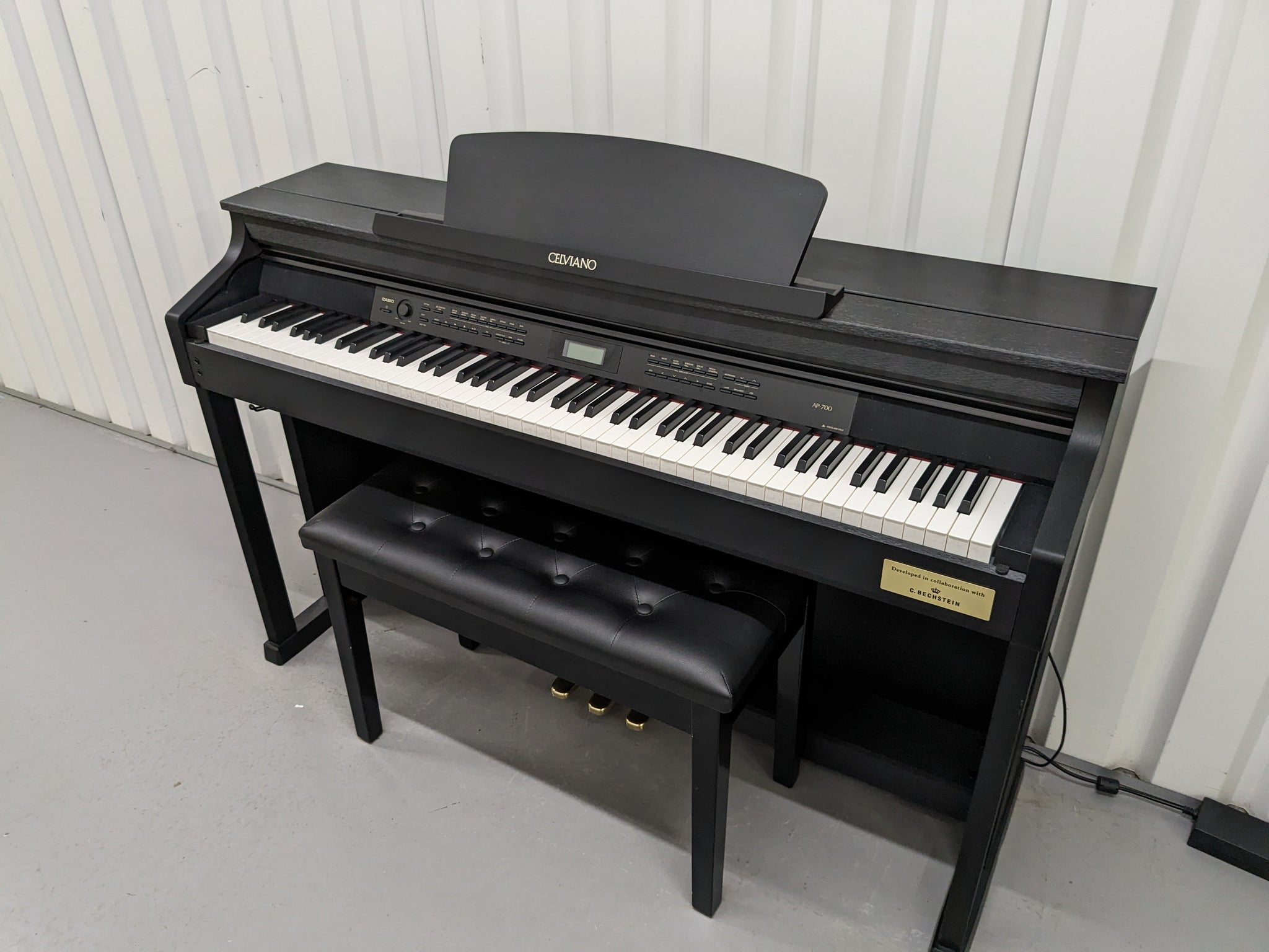 Casio Celviano AP 700 digital piano and stool in satin black finish stock 24094