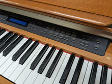 Load image into Gallery viewer, Yamaha Clavinova CLP-970 Digital Piano and stool in cherry wood stock nr 24105
