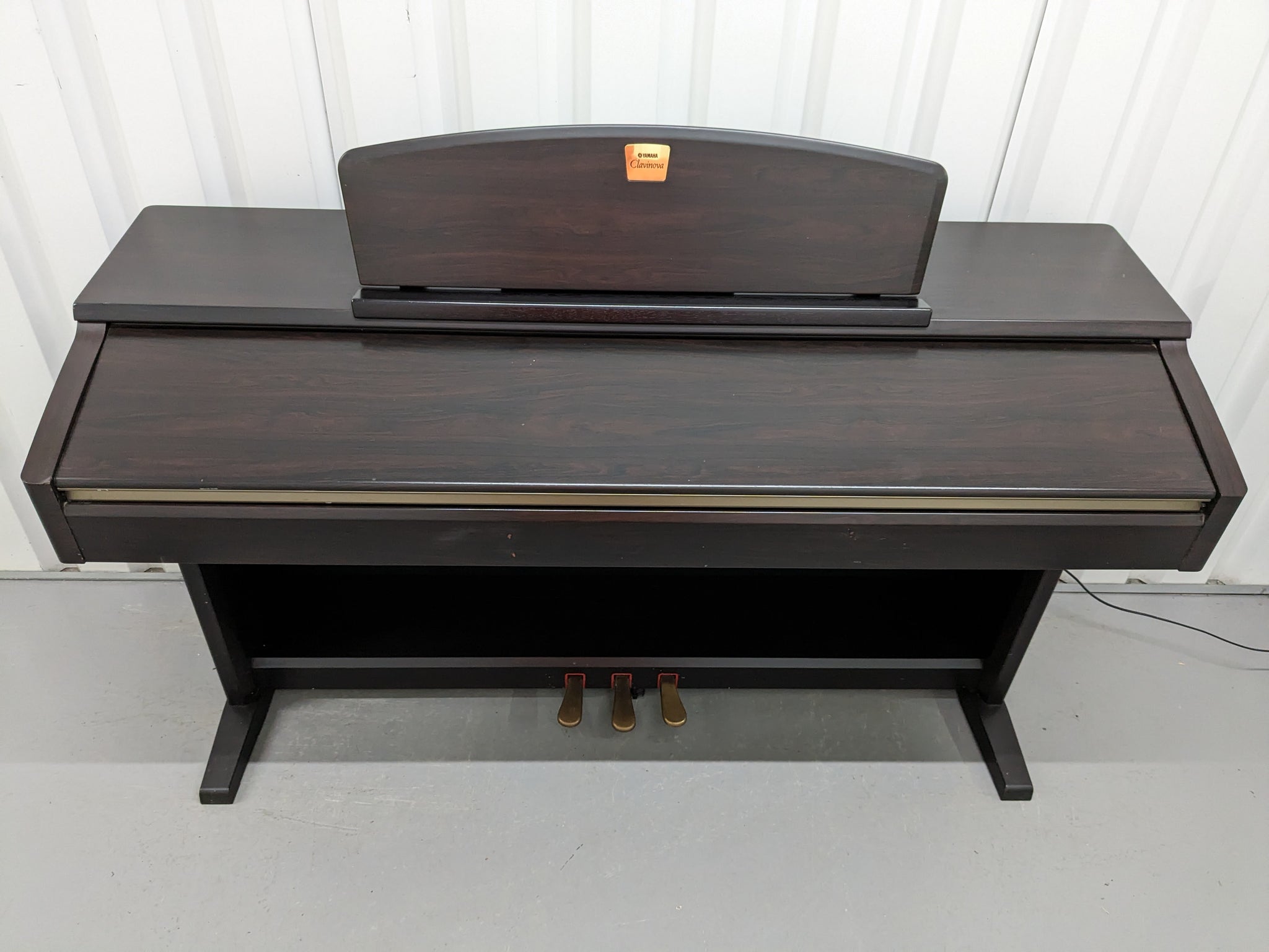 Yamaha Clavinova CLP-130 Digital Piano in dark rosewood stock #24103 –  Sulinda Music