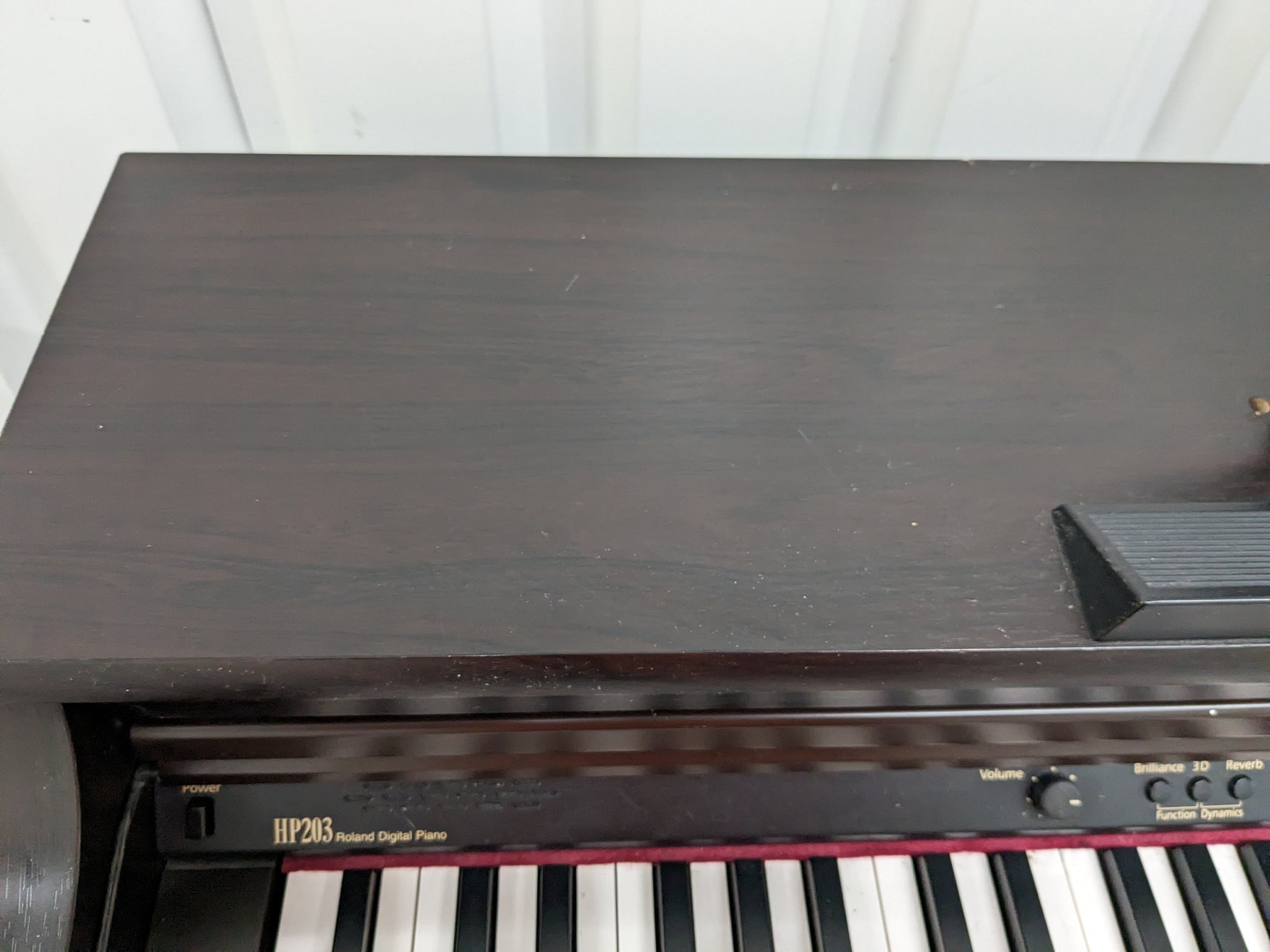 Roland HP203 digital piano and stool in dark rosewood finish