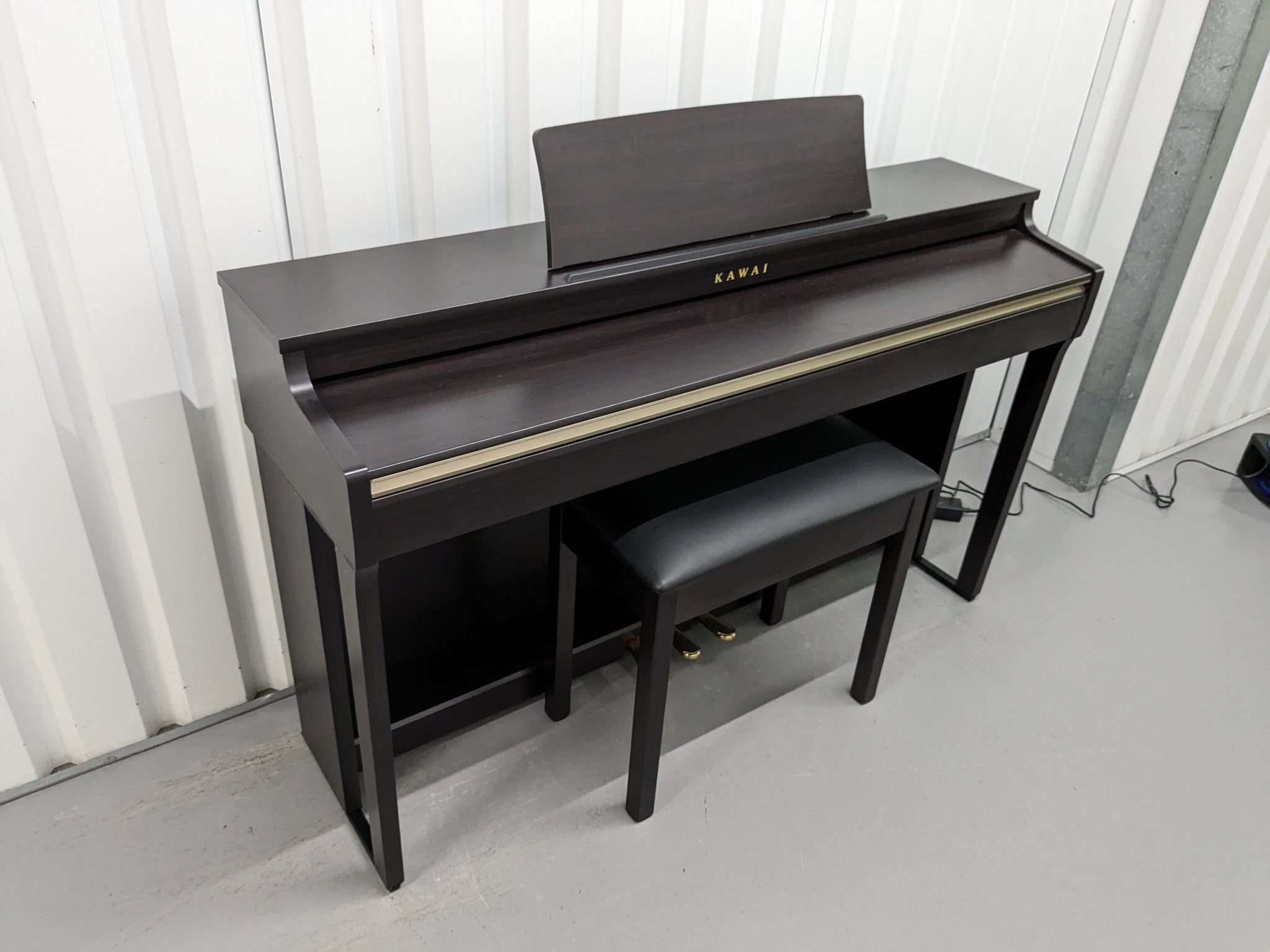 Kawai CN27 digital piano and stool in rosewood finish stock number