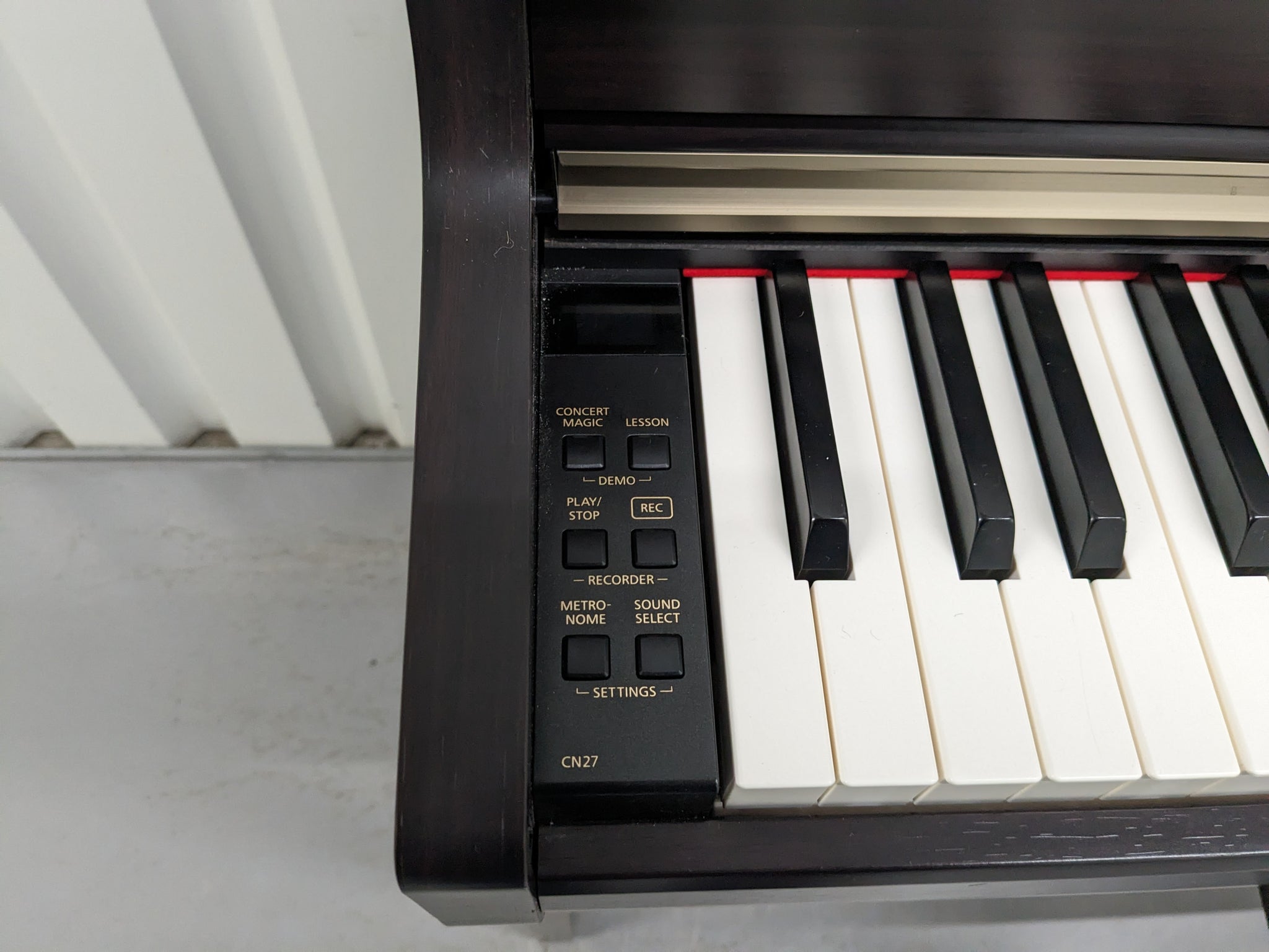 Kawai CN27 digital piano and stool in rosewood finish stock number