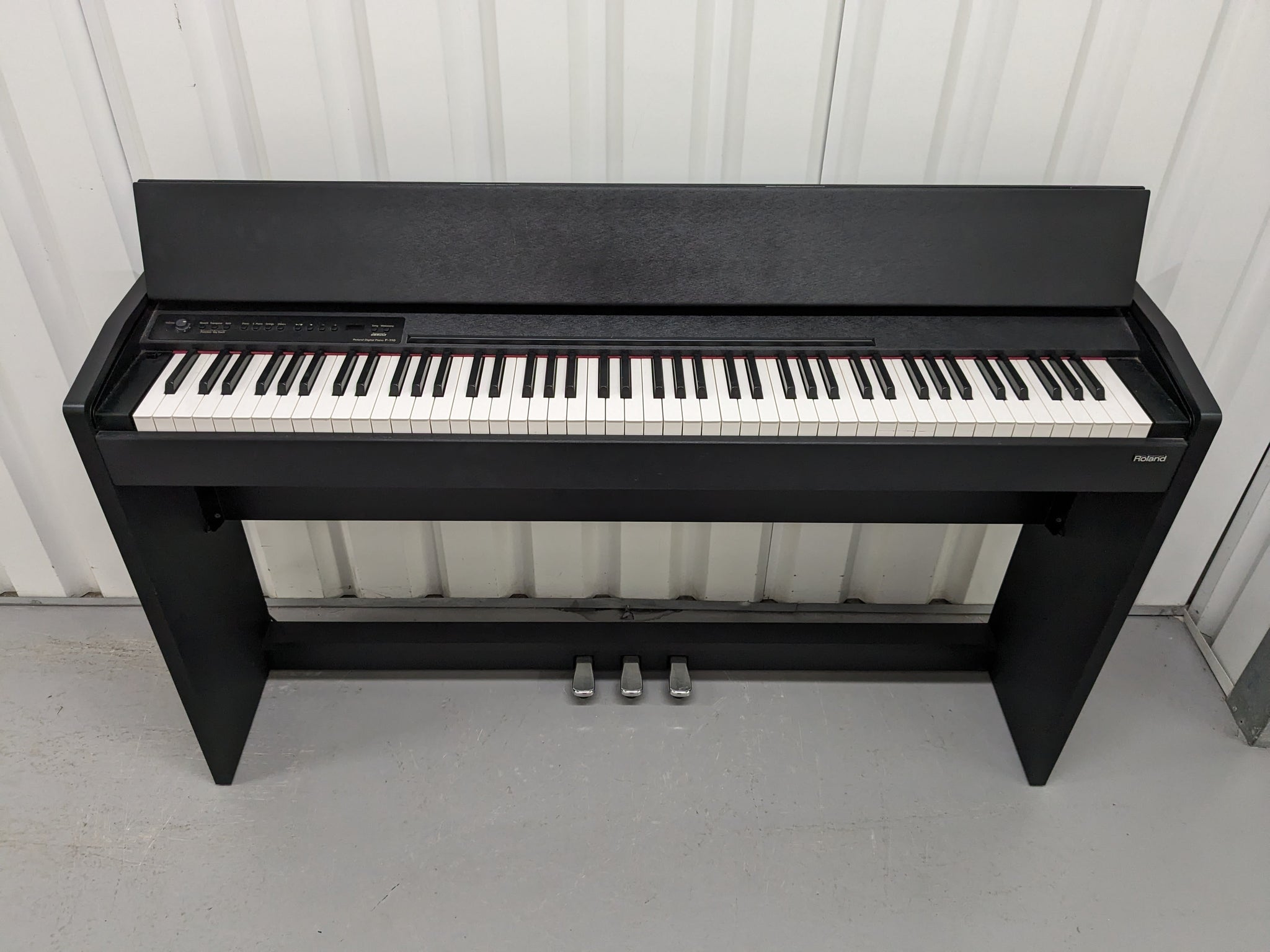 Roland F-110 compact slim size Digital Piano in black stock