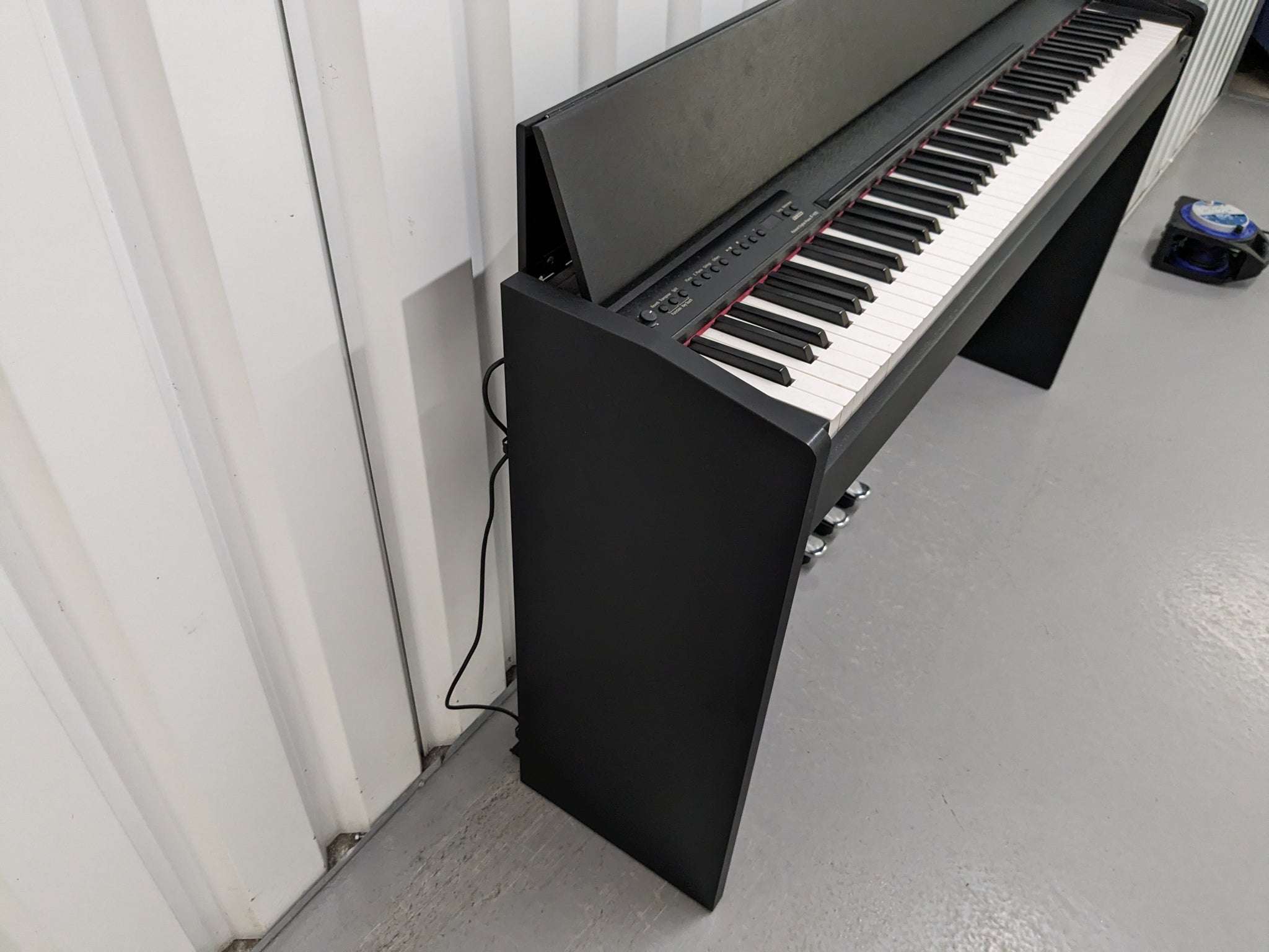 Roland F-110 compact slim size Digital Piano in black stock