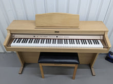 Load image into Gallery viewer, Roland HP102e digital piano and stool in light oak finish stock number 24134
