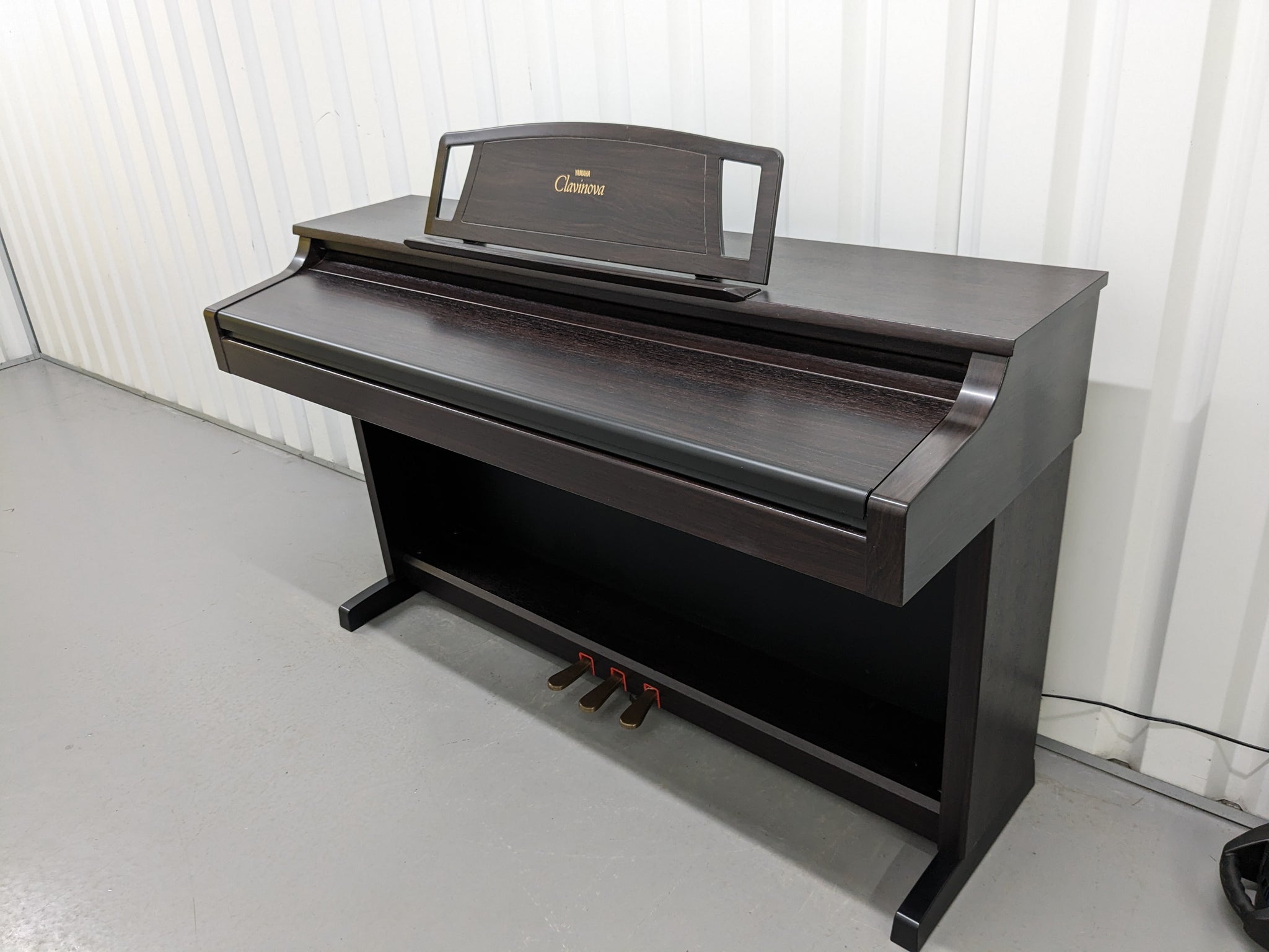 Yamaha Clavinova CLP-511 Digital Piano in dark rosewood finish stock # –  Sulinda Music