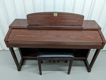 Load image into Gallery viewer, Yamaha Clavinova CLP-150 digital piano and stool in mahogany stock #24205
