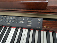 Load image into Gallery viewer, Yamaha Clavinova CLP-150 digital piano and stool in mahogany stock #24205
