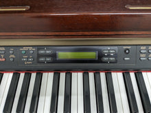 Load image into Gallery viewer, Yamaha Clavinova CLP-150 digital piano and stool in mahogany stock #24205
