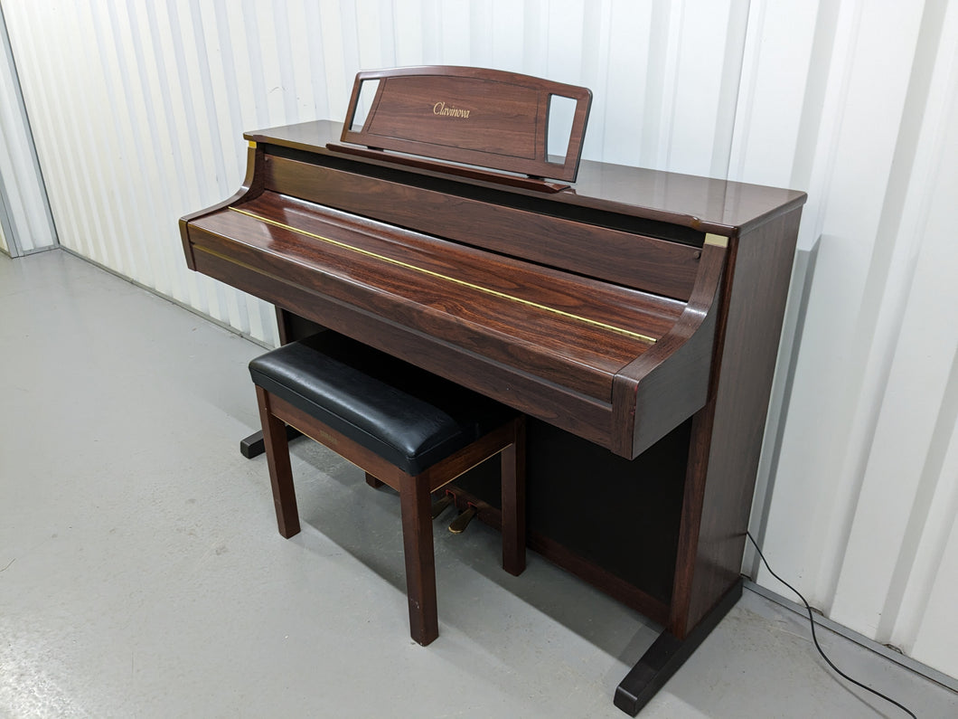 Yamaha Clavinova CLP-880 digital piano and stool in mahogany finish stock number 24193