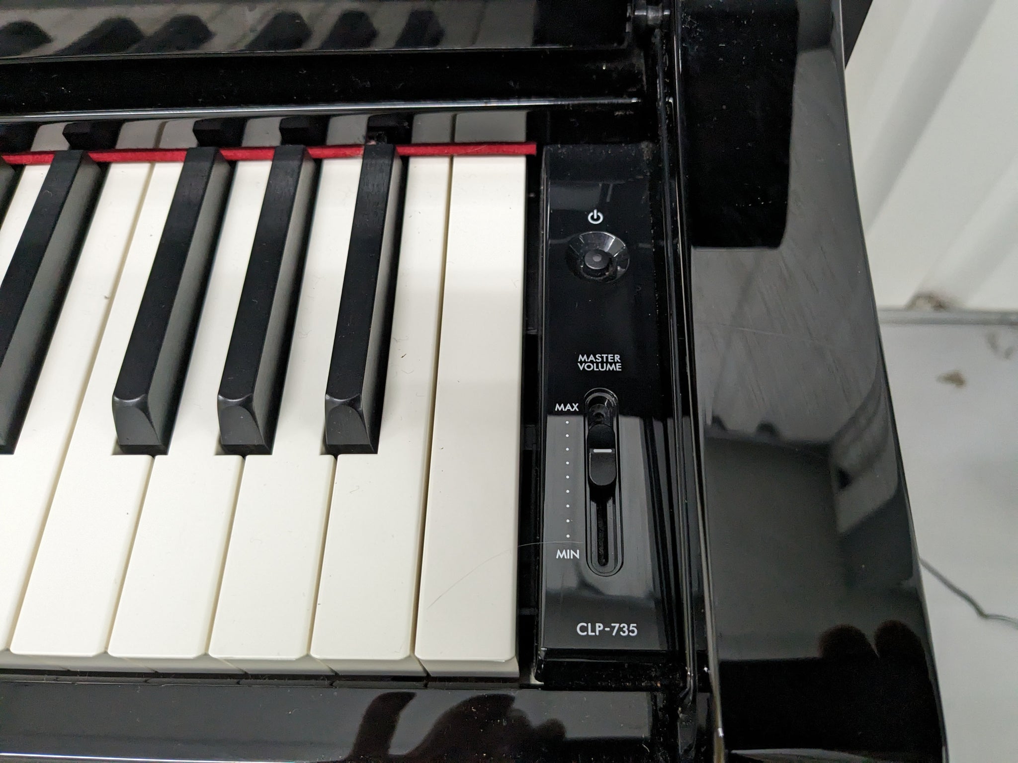Yamaha Clavinova CLP-735 in polished ebony with stool and Yamaha Clavinova CLP-735 in polished ebony with stool and