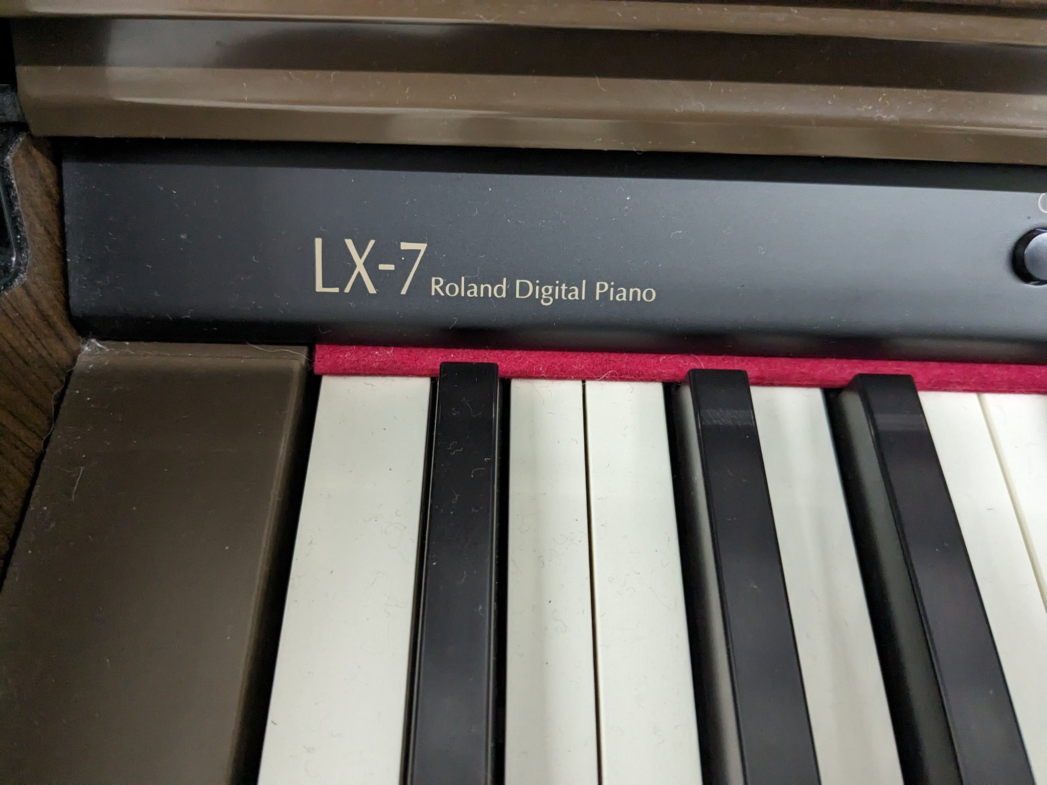 Roland LX-7 Luxury Digital Piano and stool in brown walnut finish 