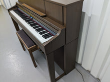 Load image into Gallery viewer, Roland LX-7 Luxury Digital Piano and stool in brown walnut finish Stock nr 24259
