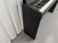 Load image into Gallery viewer, Roland F120R compact slim size Digital Piano and stool in black  stock # 24279
