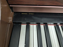 Load image into Gallery viewer, TECHNICS SX-PX662 DIGITAL PIANO AND STOOL IN MAHOGANY  stock number 24284
