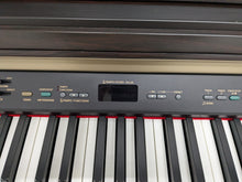 Load image into Gallery viewer, Yamaha Clavinova CLP-120 Digital Piano in dark rosewood stock #24285
