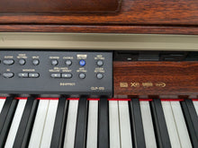 Load image into Gallery viewer, Yamaha Clavinova CLP-170 Digital Piano and stool in mahogany colour stock #24287
