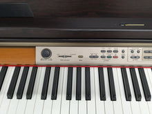 Load image into Gallery viewer, Yamaha Clavinova CLP-150 digital piano in dark rosewood finish stock #24234
