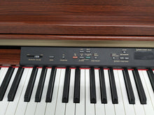 Load image into Gallery viewer, Yamaha Clavinova CLP-230 Digital Piano and stool in mahogany stock nr 24294
