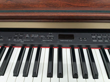 Load image into Gallery viewer, Yamaha Clavinova CLP-330 Digital Piano and stool in mahogany stock #24301
