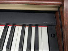 Load image into Gallery viewer, Yamaha Clavinova CLP-330 Digital Piano and stool in mahogany stock #24301
