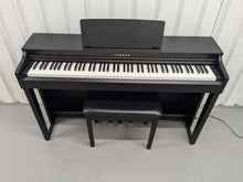 Load image into Gallery viewer, Yamaha clavinova CLP-525 digital piano and stool in satin black stock # 24304
