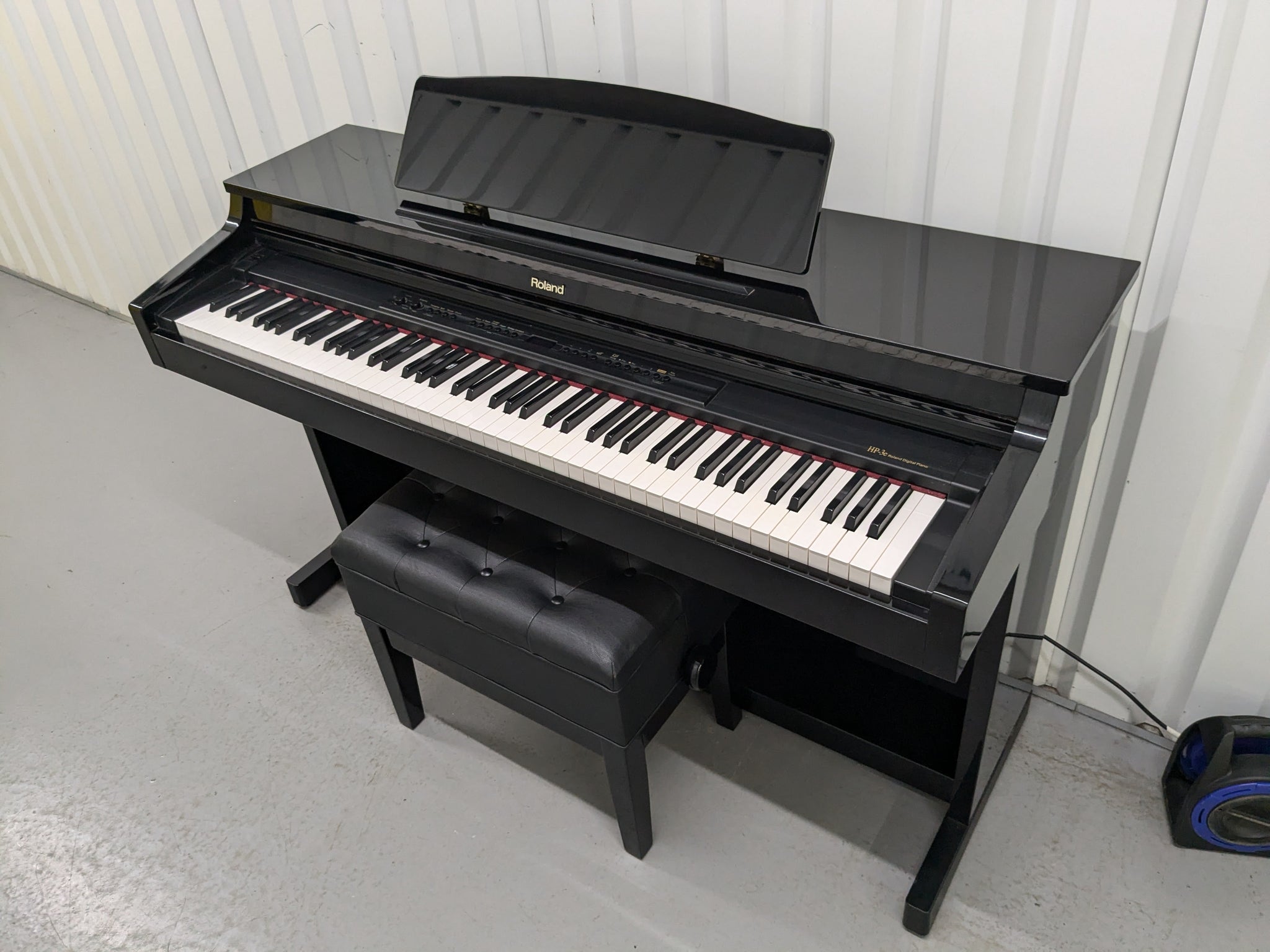 Roland HP-3e Digital Piano and stool in glossy black polished