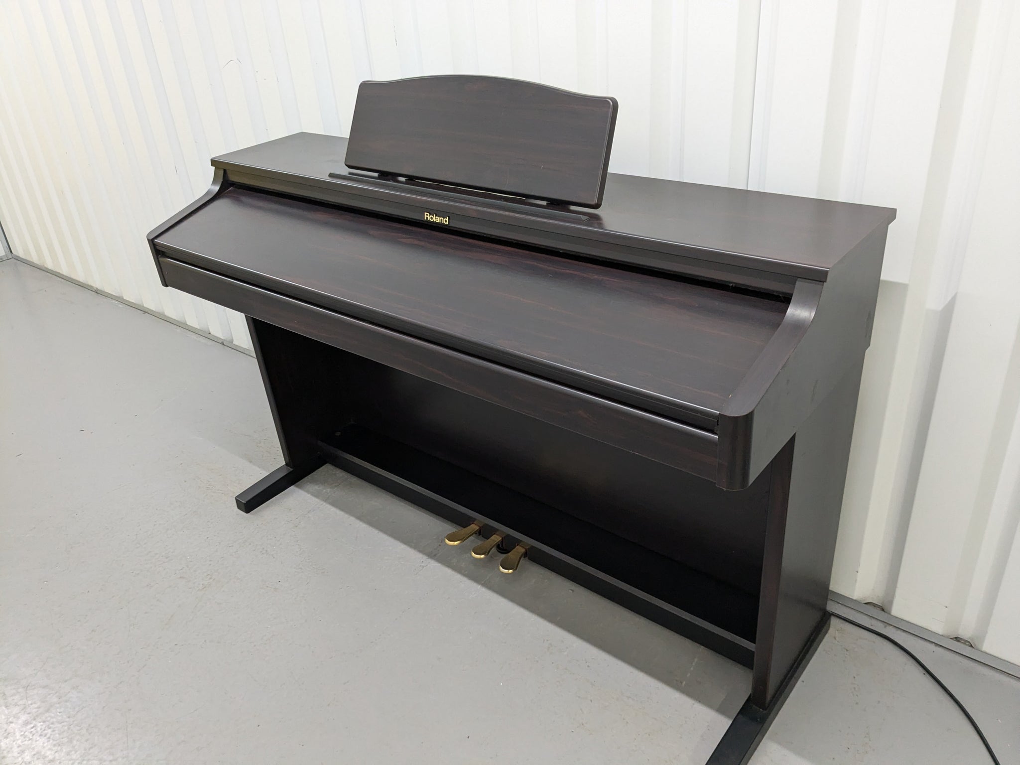 Roland HP-2e digital piano in dark rosewood finish stock number 