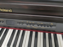 Load image into Gallery viewer, Roland HP-2e digital piano in dark rosewood finish stock number 24303
