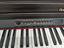 Load image into Gallery viewer, Roland HP-2e digital piano in dark rosewood finish stock number 24303
