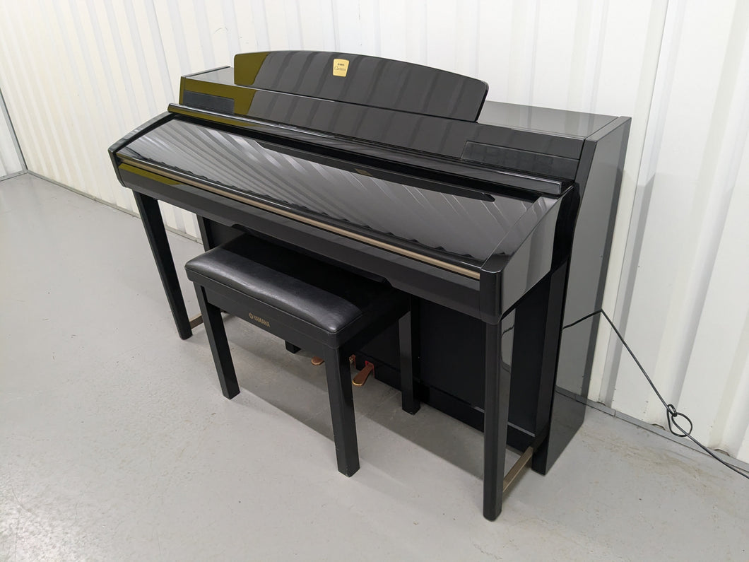 Yamaha Clavinova CLP-280 in Polished glossy black + matching stool stock # 24292