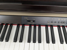 Load image into Gallery viewer, Yamaha Clavinova CLP-930 Digital Piano in dark rosewood finish stock #24330
