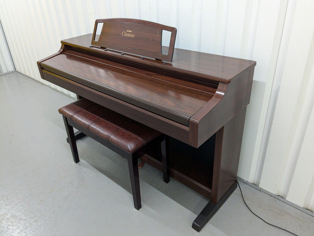 Yamaha Clavinova CLP-860 Digital Piano and stool in mahogany stock # 2 –  Sulinda Music