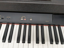 Load image into Gallery viewer, Yamaha Clavinova CLP-311 Digital Piano and stool in dark rosewood stock no 24322
