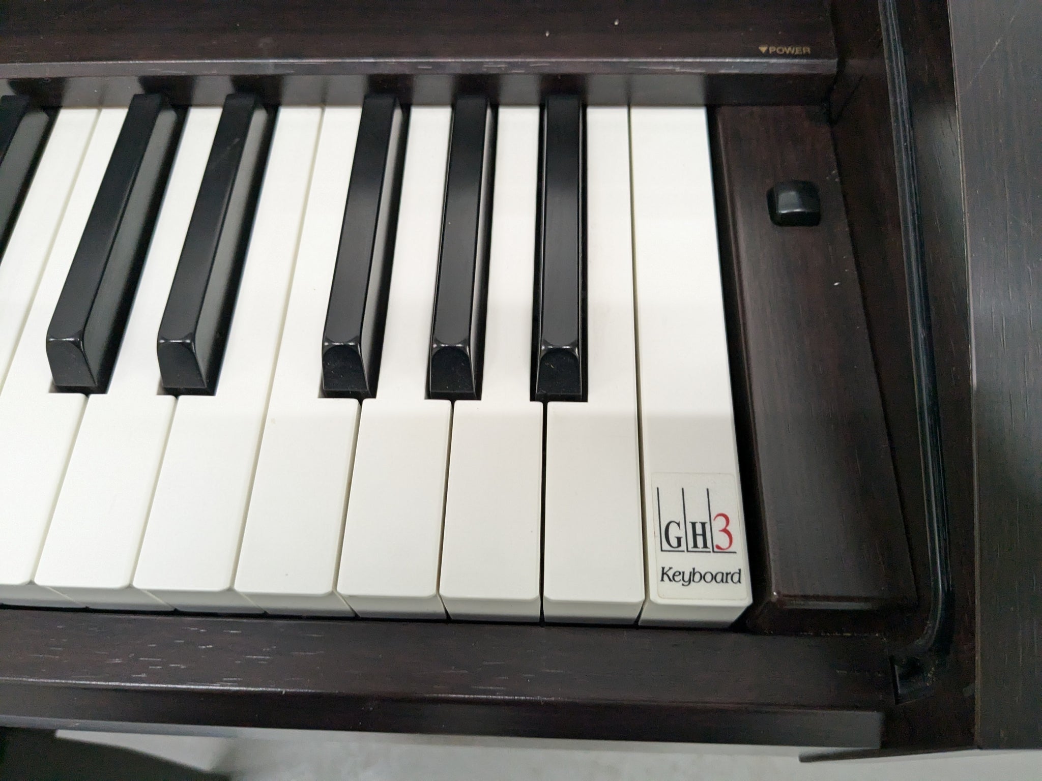 Yamaha Clavinova CLP-230 Digital Piano and stool in dark