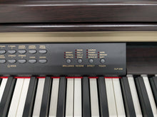 Load image into Gallery viewer, Yamaha Clavinova CLP-230 Digital Piano and stool in dark rosewood stock nr 24316
