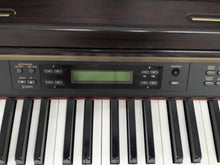 Load image into Gallery viewer, YAMAHA CLAVINOVA CLP-270 DIGITAL PIANO AND STOOL IN DARK ROSEWOOD stock nr 24318
